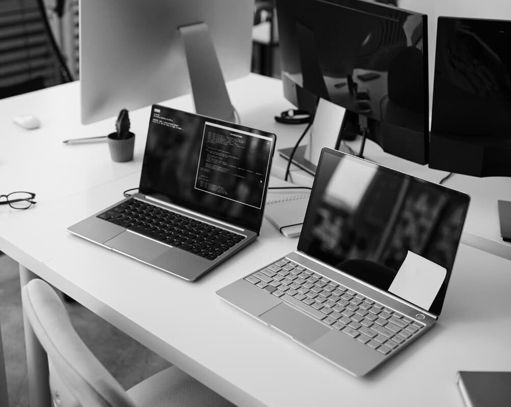 black_part-of-office-with-group-of-laptops-and-computer-2026-01-08-07-41-48-utc copy.jpg